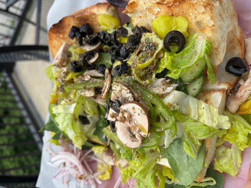 Veggie Po'boy: mushrooms, olives, lettuce, spicy peppers and cucumber on toasted French bread