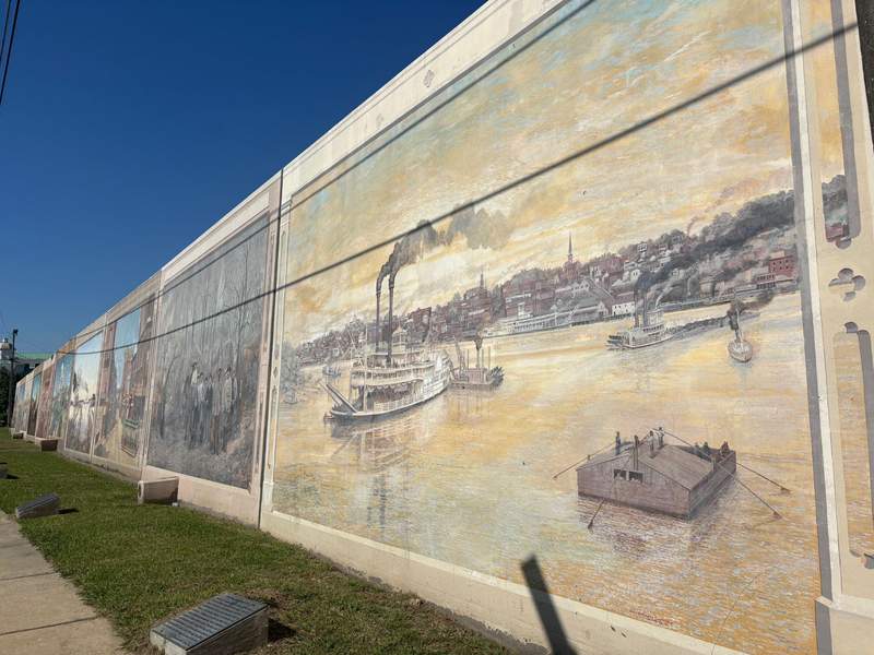 Traffic on the Mississippi River in a mural