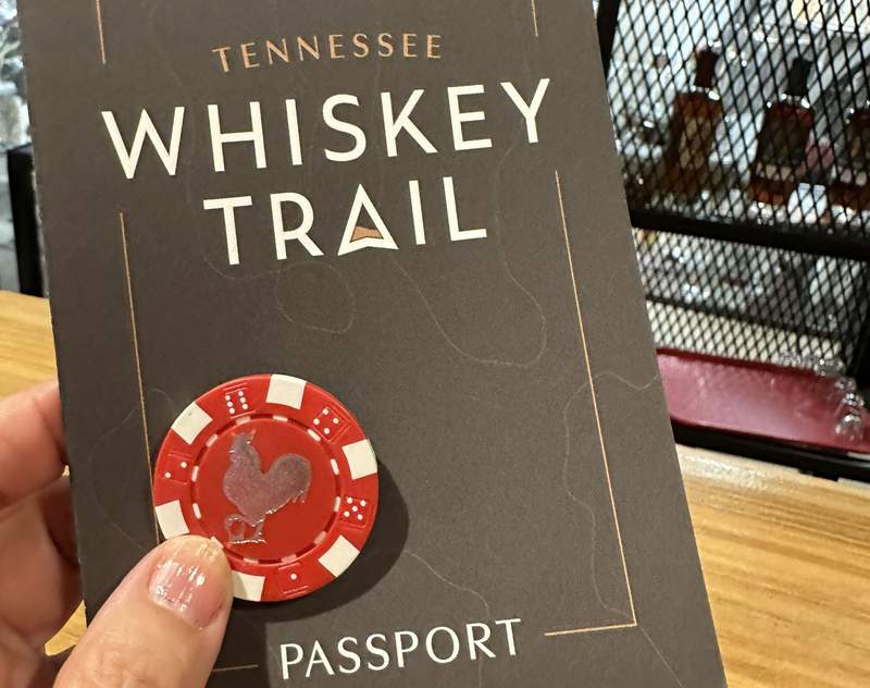 A Whiskey Trail passport and a token.