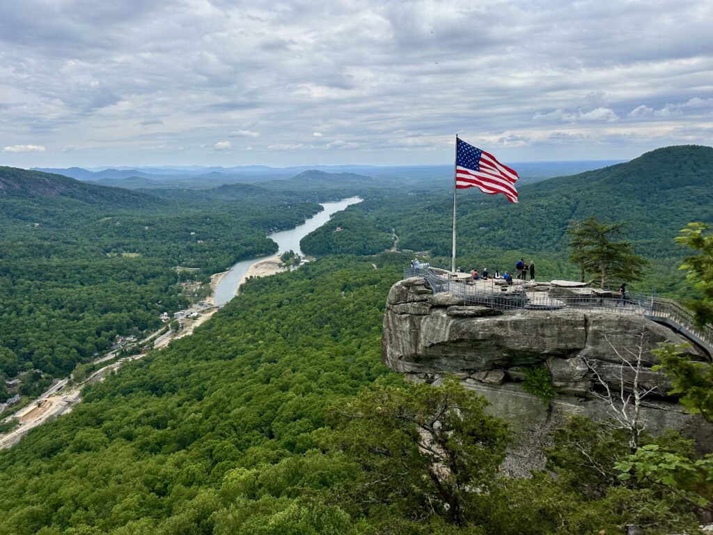 View of Hickory Nut Gorge and Chimney Rock with US Flag in Western North Carolina