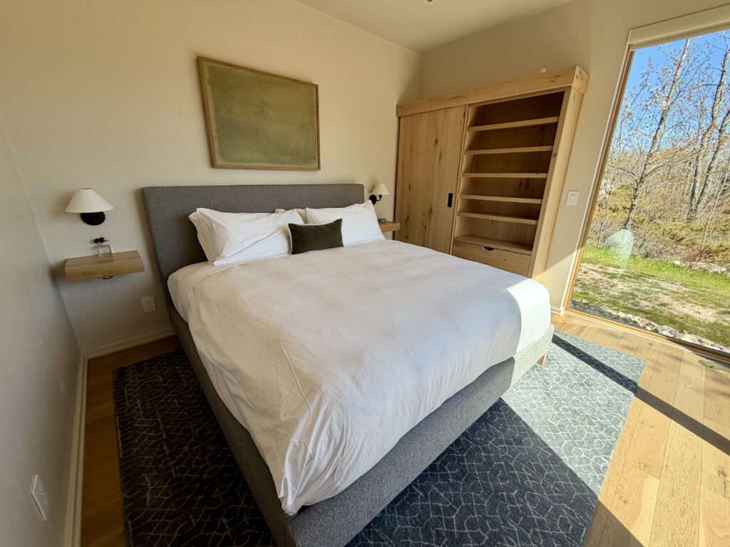 Scandinavian style bedroom in the Shade Tree unit at Loma Cottages in Egg Harbor Wisconsin