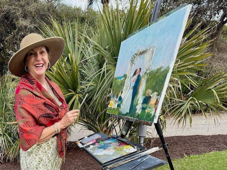 Woman painter at easel, surrounded by brushes and paint supplies
