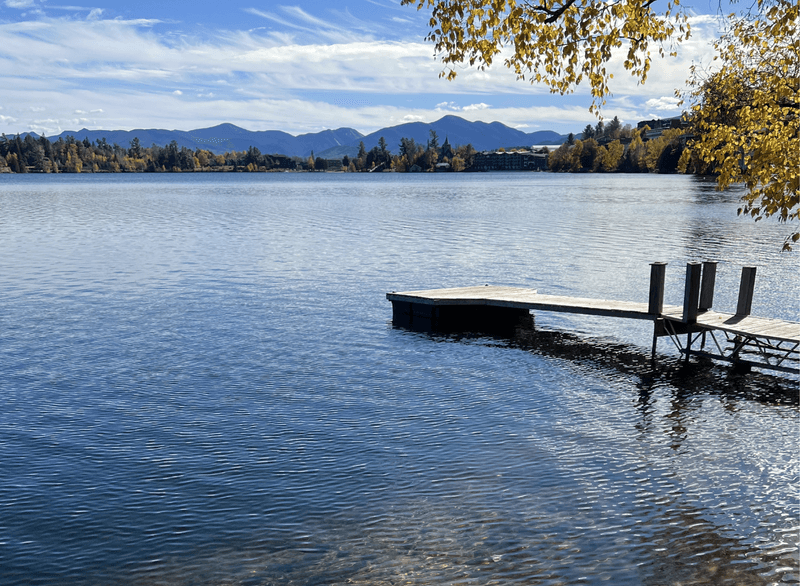 The sparkling waters of mirror lake in downtown Lake Placid in the fall.