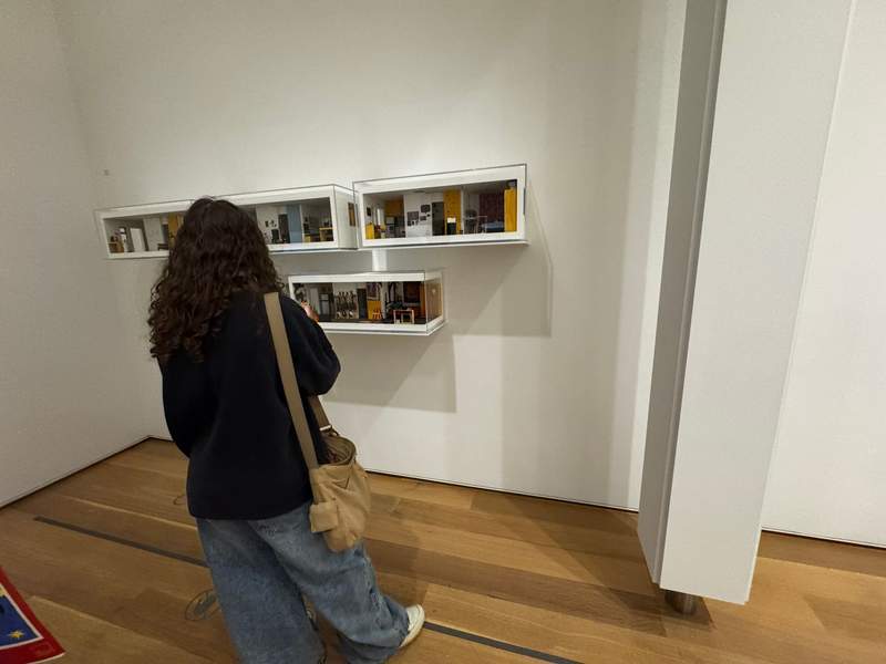 My daughter looking at a modular cube installation in A New View: 20th- and 21st-Century Architecture and Design at the Art Institute of Chicago.