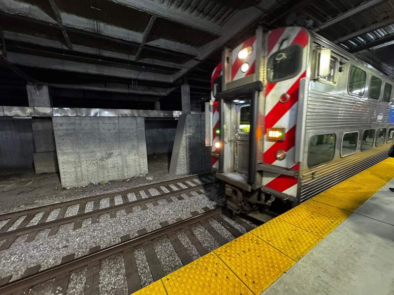 CTA ‘L’ train arrives just under McCormick Place through downtown Chicago, as we prepare to ride back to the hotel. 