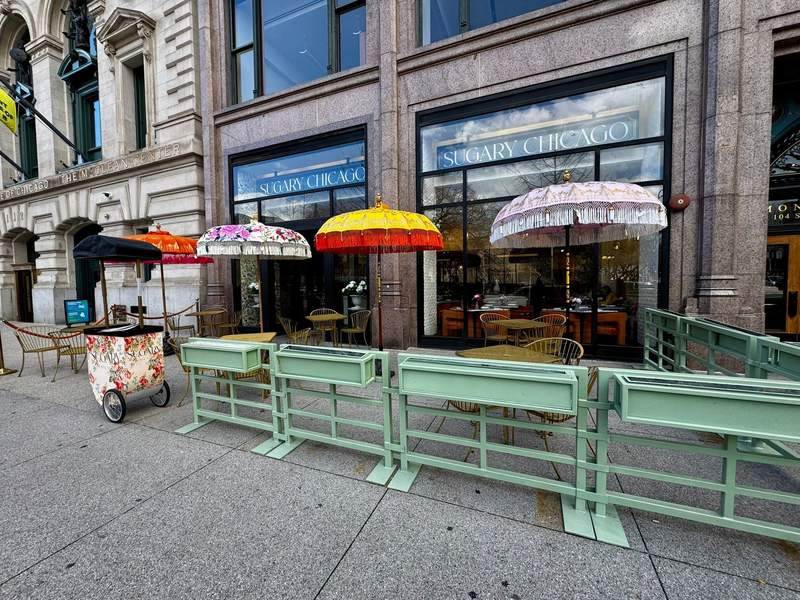 Colorful umbrellas and storefront of Sugary Chicago on Michigan Avenue’s Magnificent Mile, where we enjoyed a celebratory brunch that felt like the perfect end-of-tournament reward.