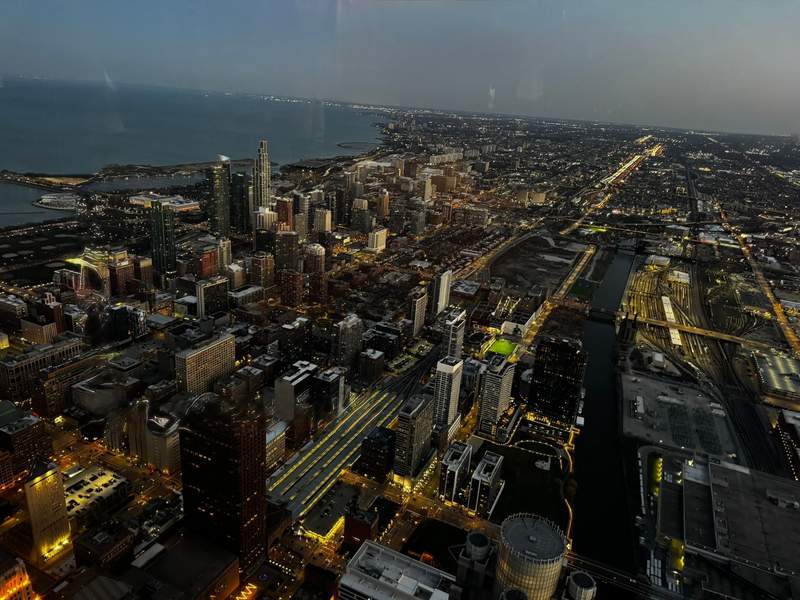 Chicago skyline viewed from the Skydeck Chicago at Willis Tower with the city stretching into the distance.