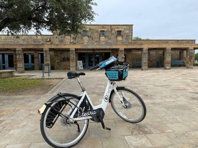 BCycle e-bike parked in front of the Visitor Center at Mission San José.