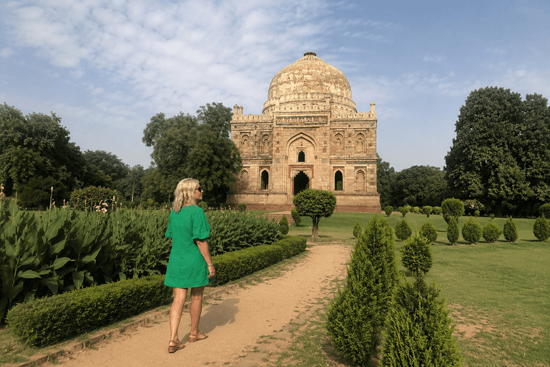 Woman walking through the Lodhi Gardens in New Delhi, India
