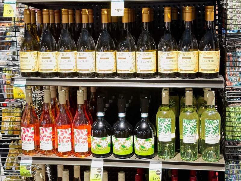 Selection of Foodland Farms brand orange, lime green wines.