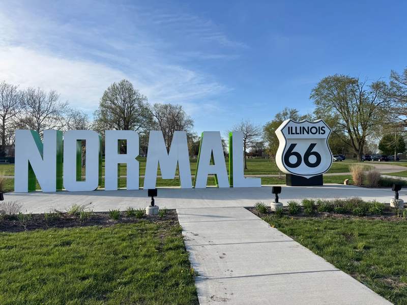 Large letters spelling out the name of the town of Normal and a Route 66 statue