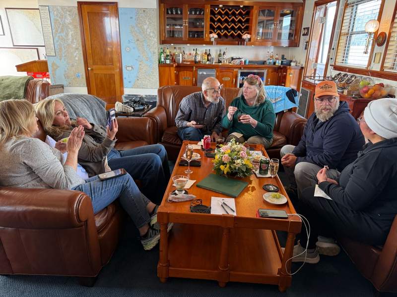 People sitting around a coffee table