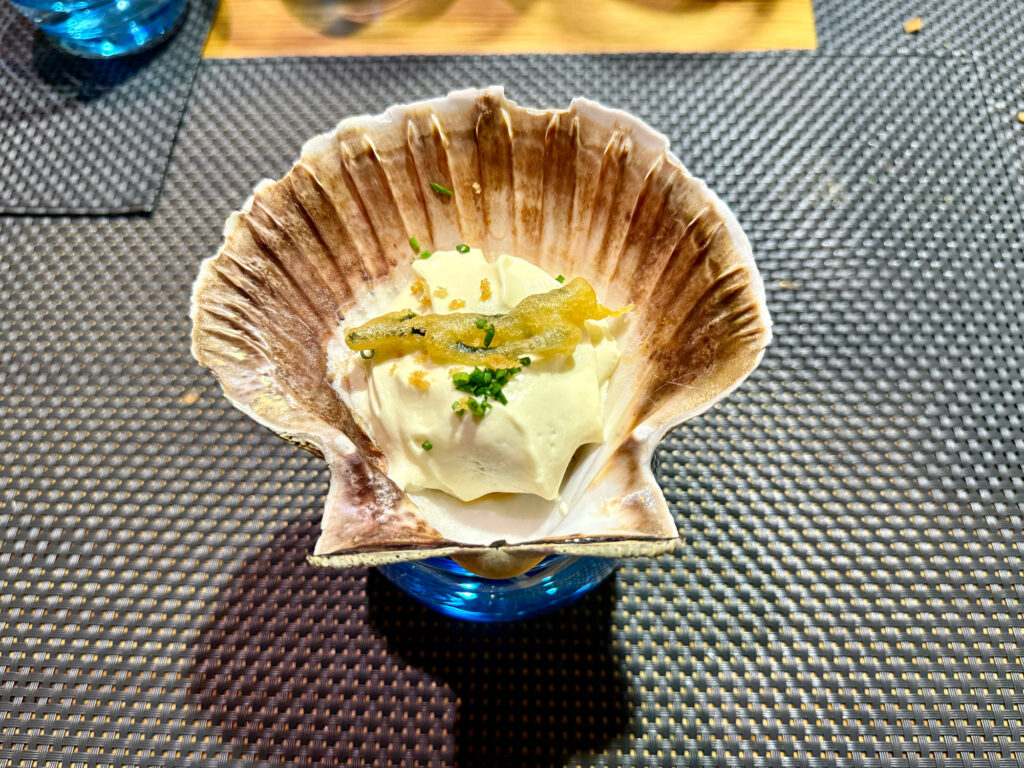A tasty, Galician dish served in a half-clam shell.