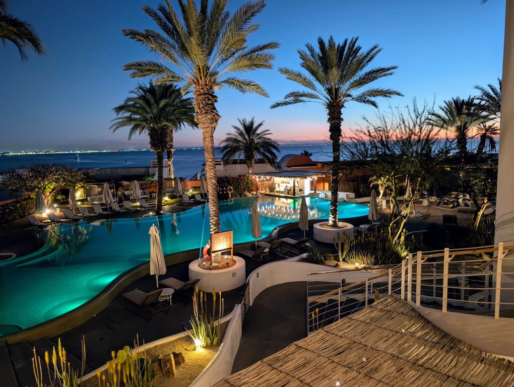 The pool at Hotel Indigo La Paz Puerta Cortés in La Paz at night
