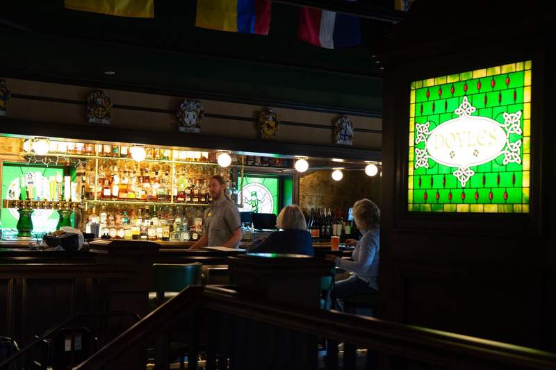 Dark and intimate Doyles pub with fully stocked bar