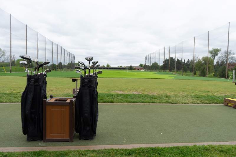 Tee off at the outdoor driving range on the Saint John's Resort golf course