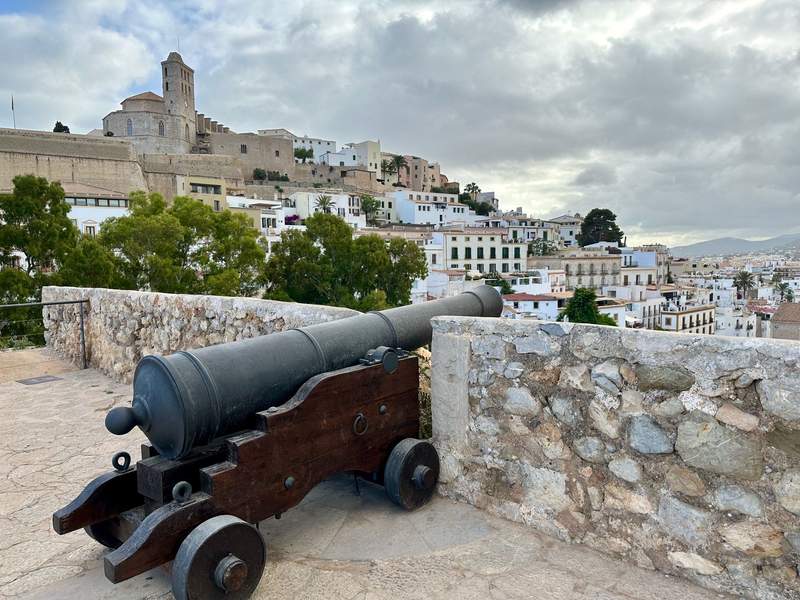 An old cannon on the fortress wall overlooking the city.