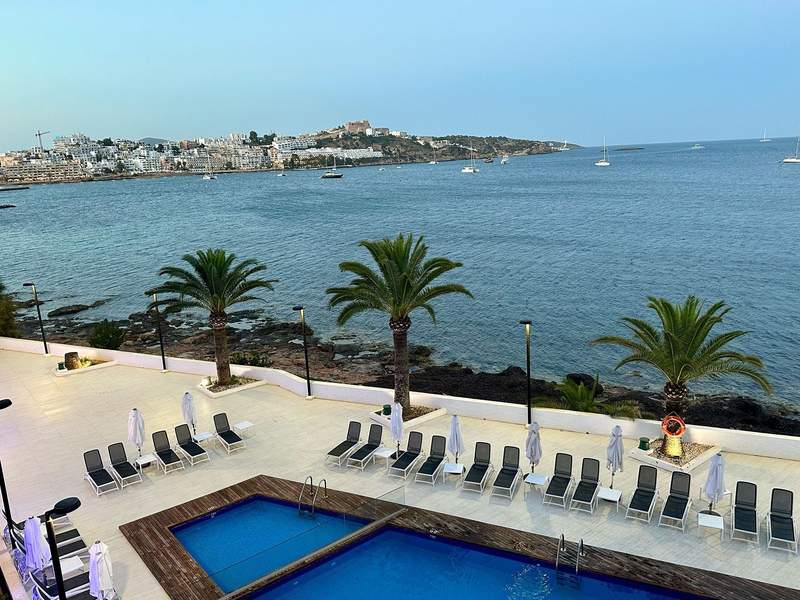 View of the pool, shoreline, harbor and peninsula from our hotel room.