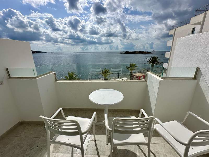 Looking across our hotel room balcony to the beach and sea.