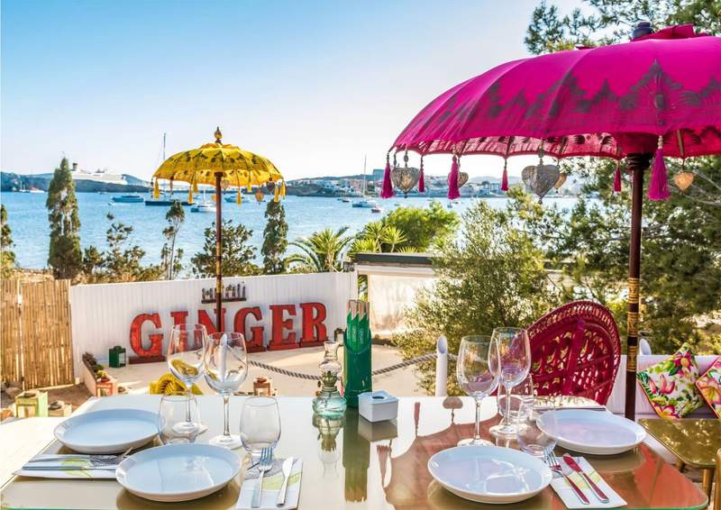 Colorful restaurant patio overlooking the water.