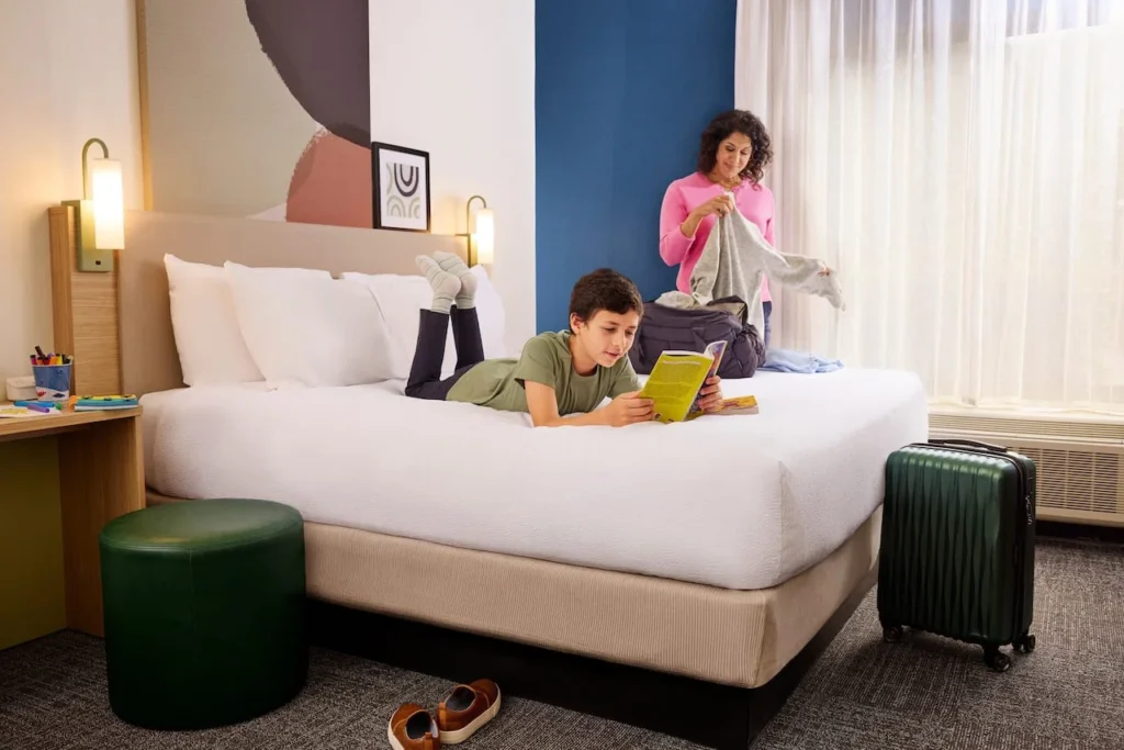 woman and boy in a Spark by Hilton hotel room