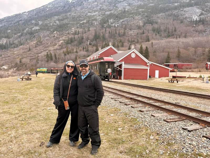 At Bennett, BC, in front of the historic train depot and White Pass & Yukon Route Railroad train.