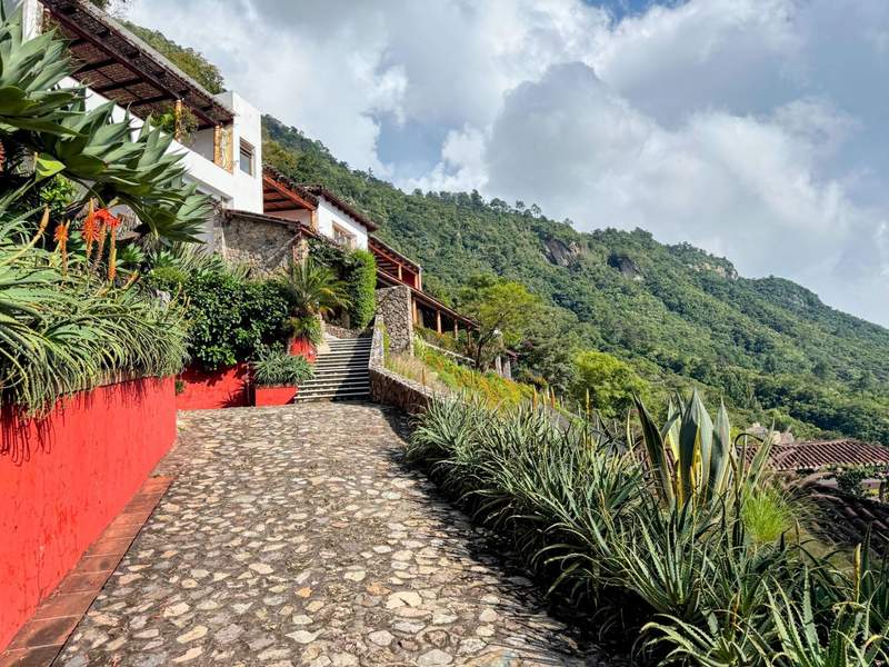 Colorful boutique luxury resort Casa Palopo built into a steep cliffside above Lake Atitlan