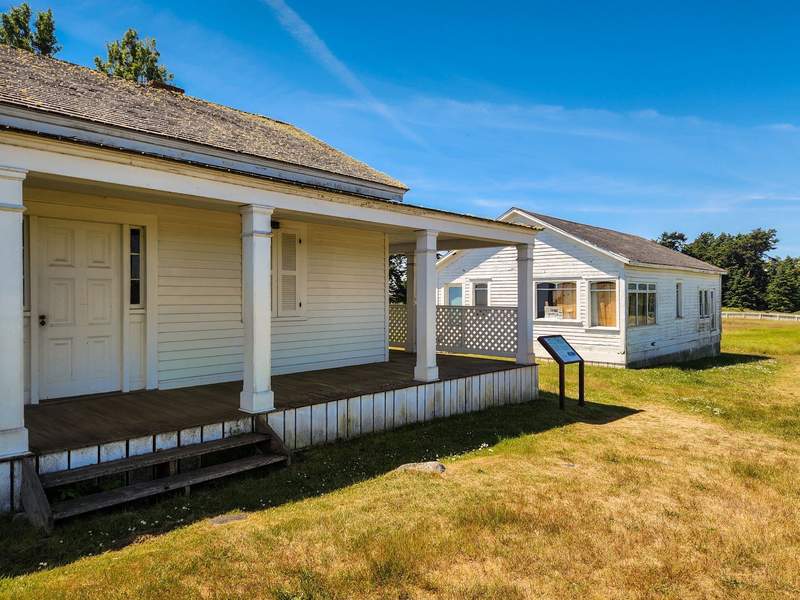 Two white historic buildings at American Camp