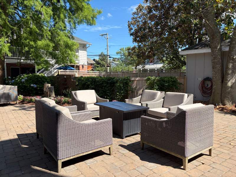 Courtyard fire pit with casual seating.