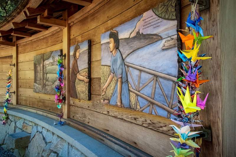Outdoor cedar wood memorial wall at the historical Eagledale ferry dock landing