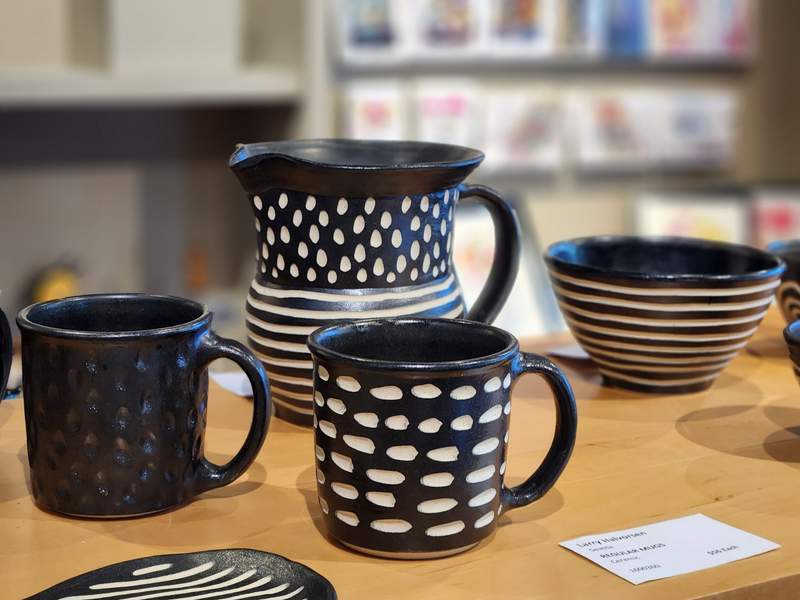 Handmade mugs at a local gallery