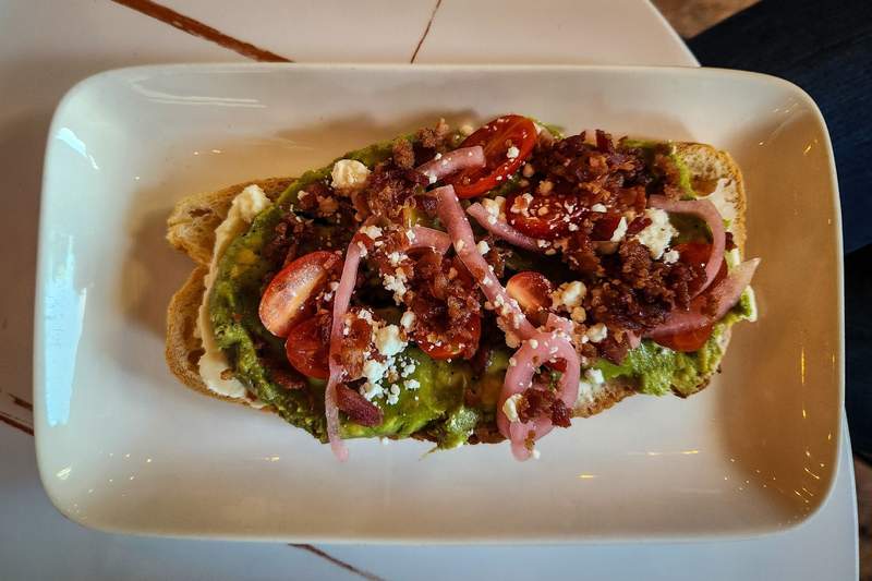 Avocado toast with cherry tomatoes