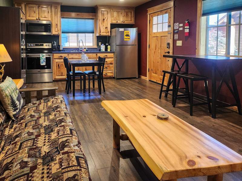 Comfortable living room inside a suite at Cedar Mountain Suites 
