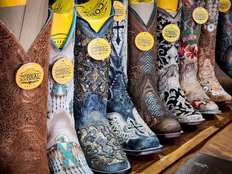 Row of sparkly new cowboy boots