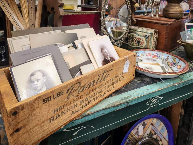 Box of antique photographs at Old Town Antique Mall in Grants Pass