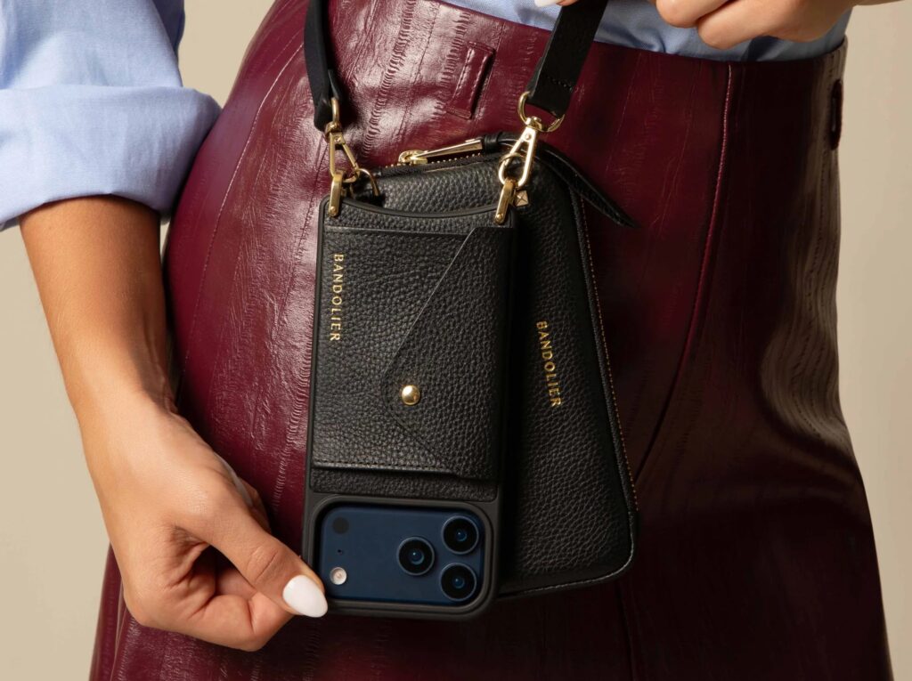 photo of woman wearing Bandolier crossbody phone case
