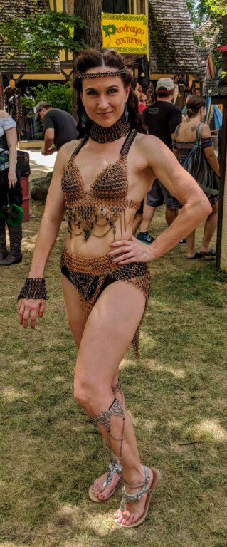 Woman wearing a chainmail ostume at the Bristol Renaissance Faire