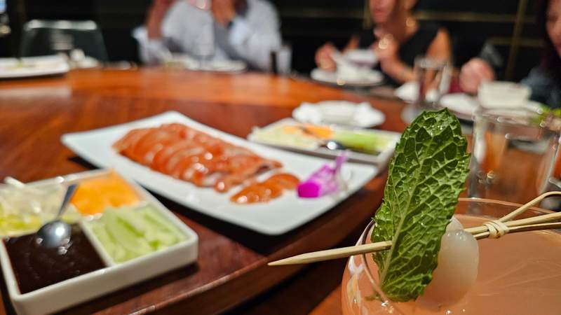 The Chinese “Lazy Susan” styled table to share a meal at restaurant