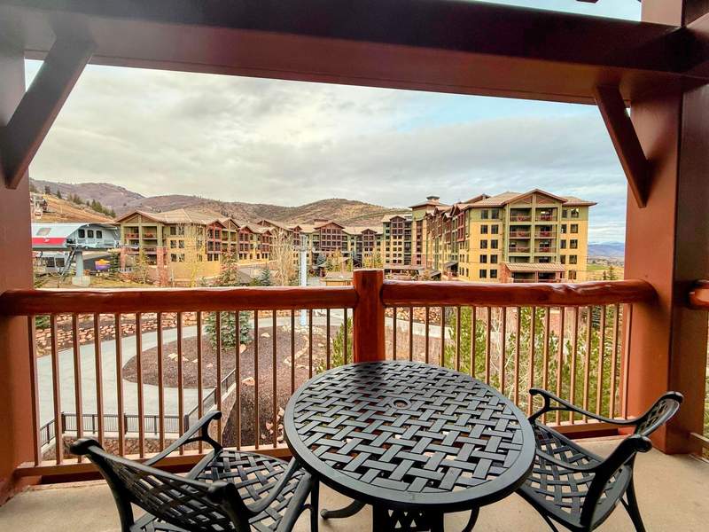 Balcony overlooking mountain resort buildings in Park City