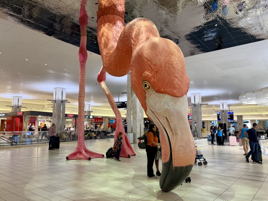 Large scale pink flamingo statue at the Tampa International Airport