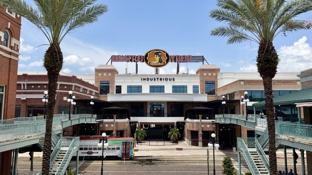 Centro Ybor facade with historic streetcar in the foreground in Tampa Florida