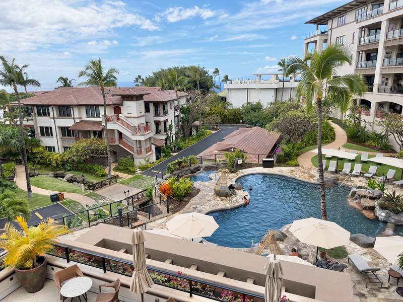Aerial view of the family pool and spa with lounge chairs at Wailea Beach Villas.