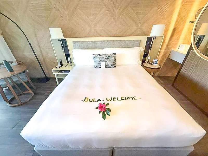 Hotel room bed with
