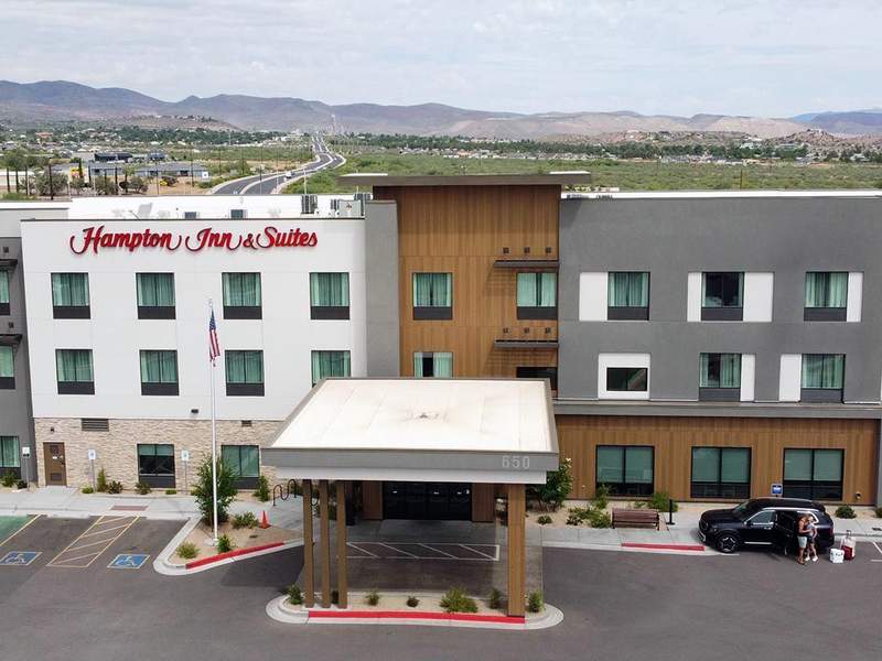 Aerial view of a Hampton Inn & Suites hotel.