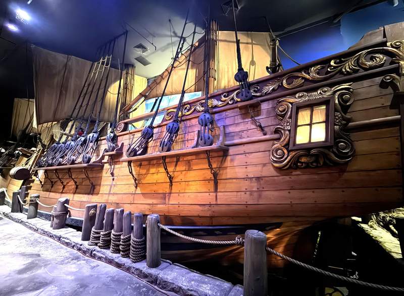 A pirate ship historical display in Pirates of Nassau in the Bahamas highlighting the islands legendary history as a pirate republic.