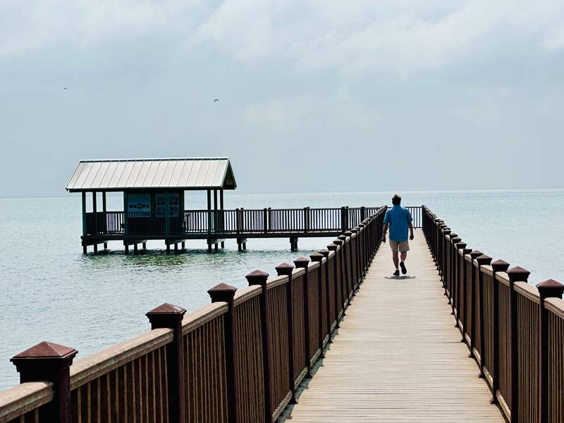 A visitor strolls the boardwalk at South Padre Island's Birding Center