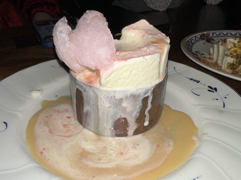 Dessert at Amerlia Gene's. Photo credit: Robin O'Neal Smith An ice cream dessert with cotton candy on top. at Amelia Gene's in Memphis, TN.