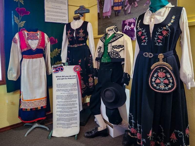 Richly embroidered dresses and men's jackets in the traditional Norwegian style