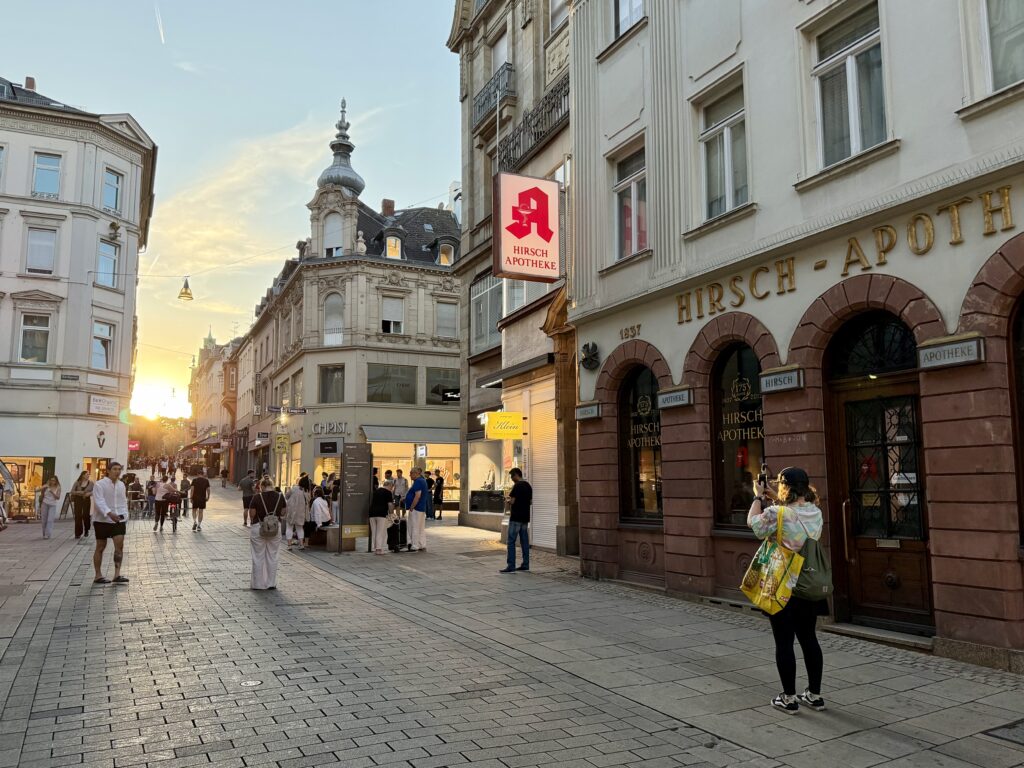 People gathered in Wiesbaden, Germany streets to view the 2026 solar eclipse