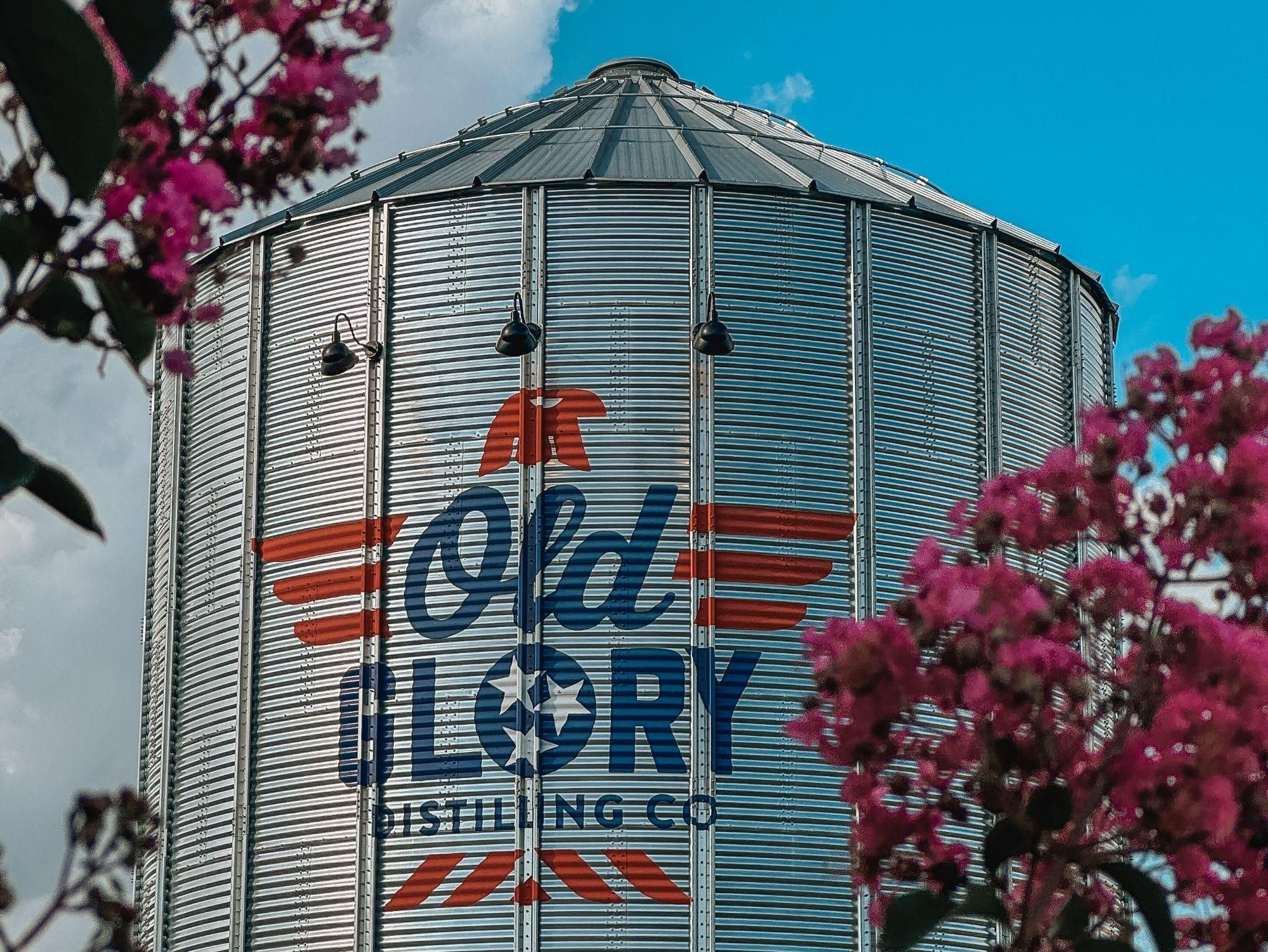 A silo with the Old Glory logo on the front. 